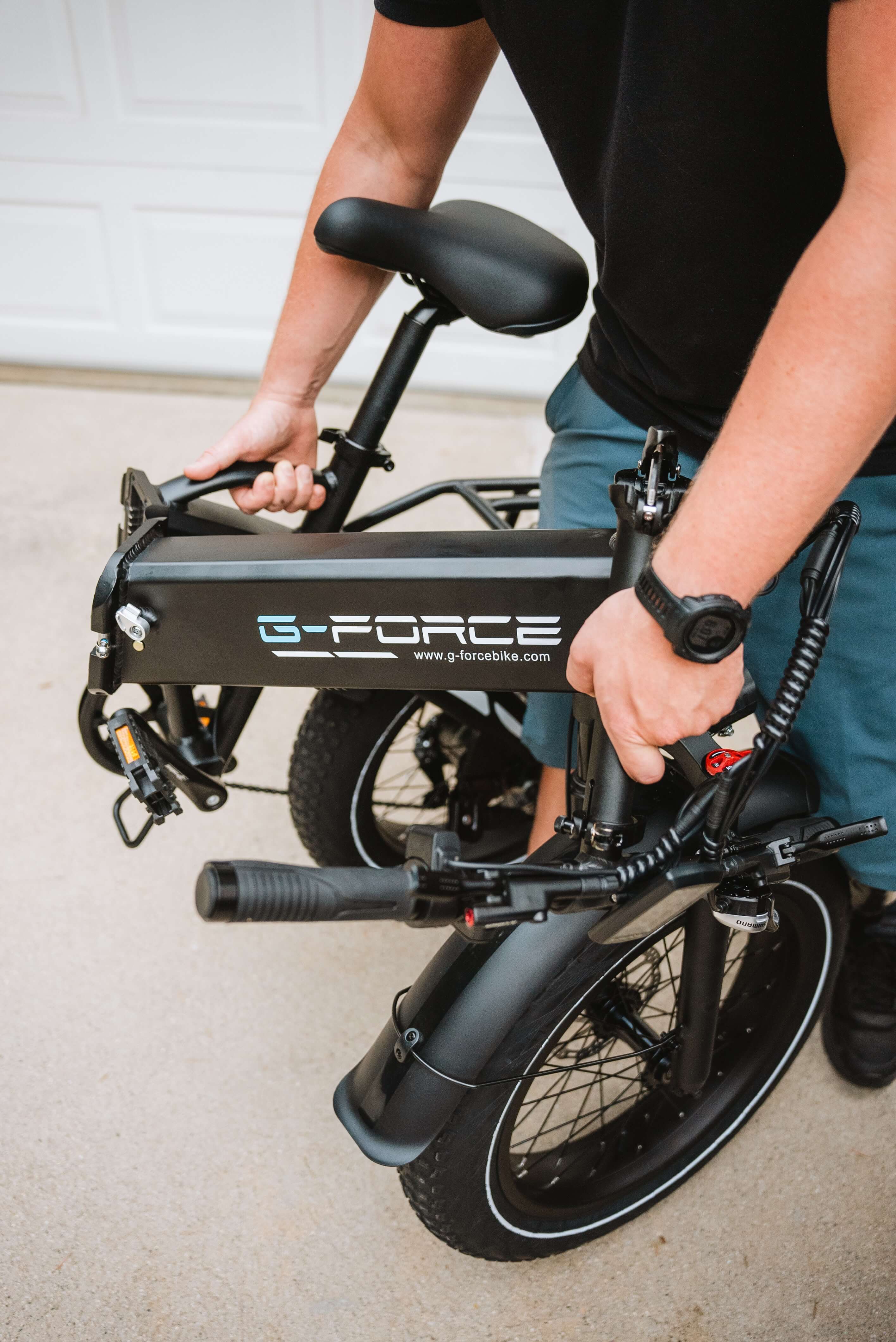 A branded G-Force bike, disassembled by its components.